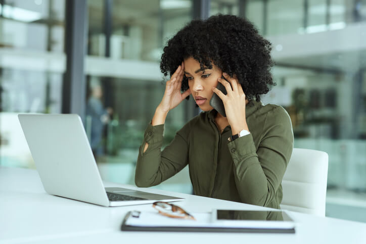 Woman on the phone with debt collector